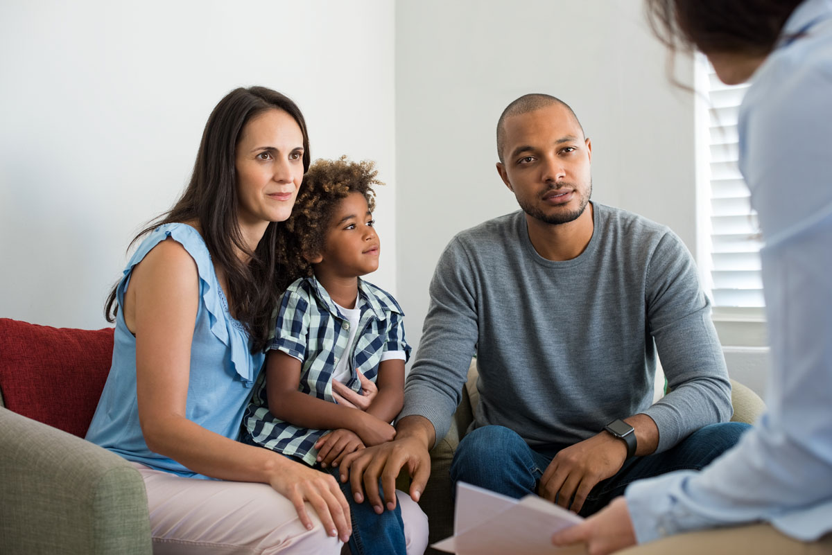 Family speaking with a counselor