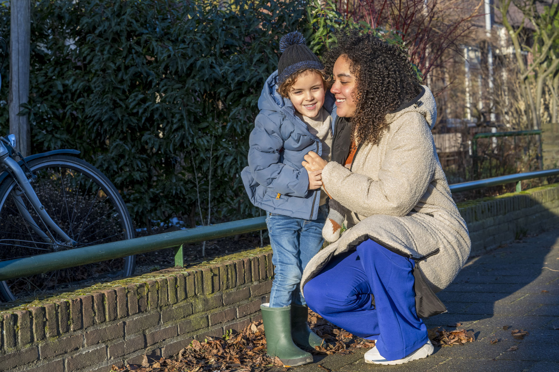 Parent and child sharing a quiet moment outdoors
